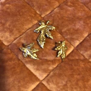 Leaf design brooch, and matching clip earrings.